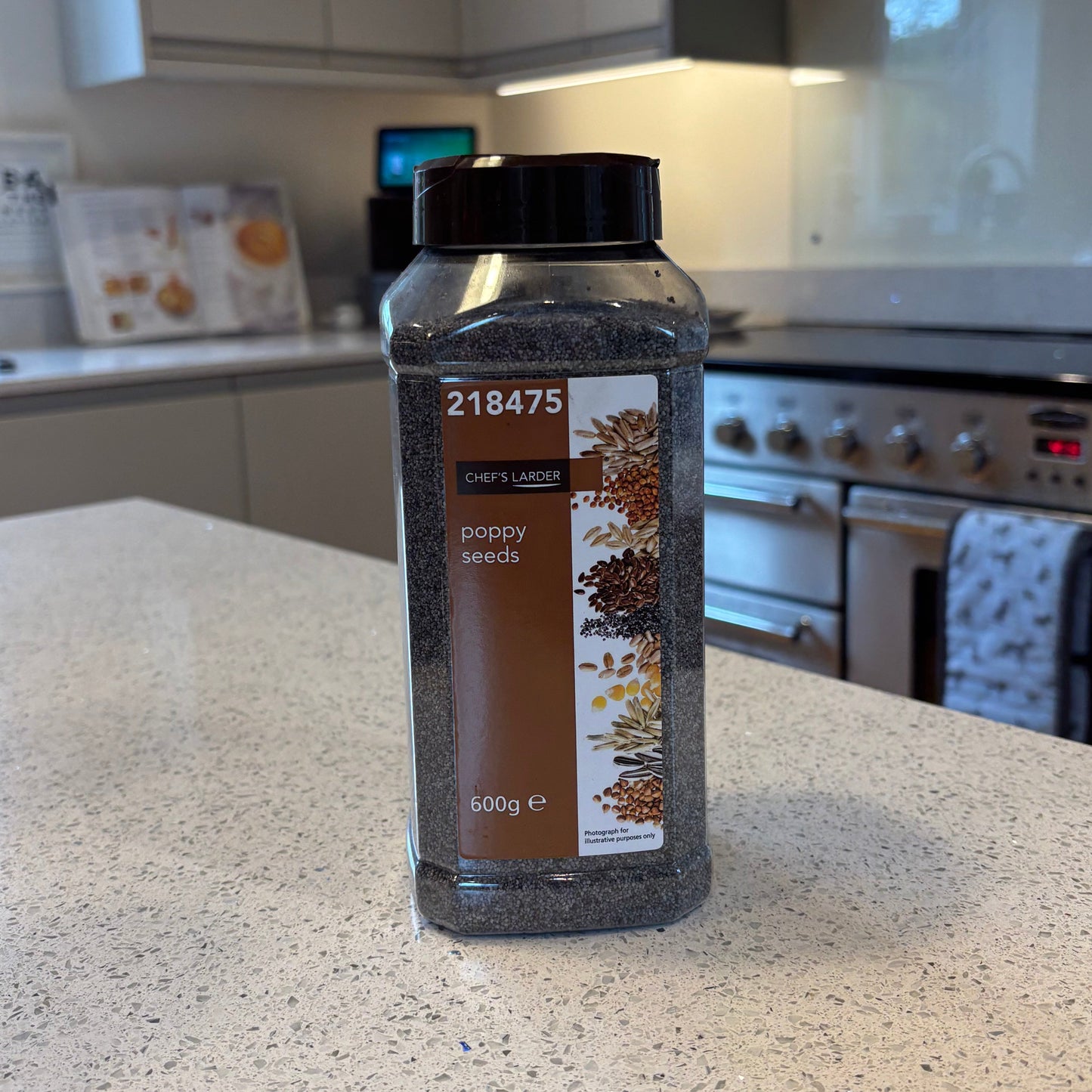 Bottle of Chef's Larder Poppy Seeds on a kitchen counter