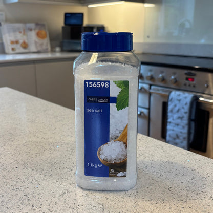 Bottle of Chef's larder Sea salt with blue cap on a kitchen counter