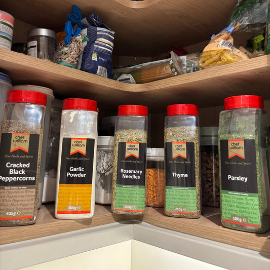 Spice rack with various spice containers in a pantry setting